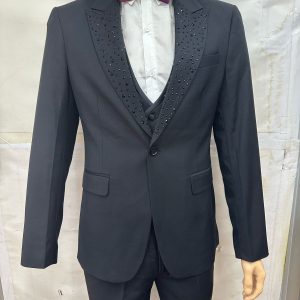 Grey 3 piece suit with a dotted lapel